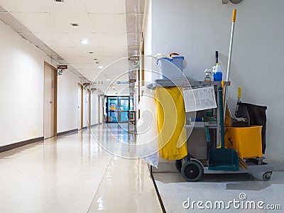 Cleaning tools cart wait for maid or cleaner in the hospital. Bucket and set of cleaning equipment in the hospital. Concept Stock Photo