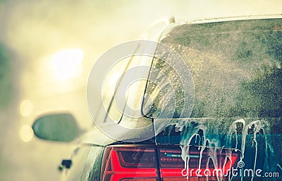 Cleaning Vehicle in Car Wash Stock Photo