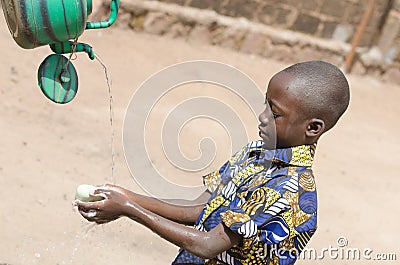 Cleaning Washing Hands - Hygiene Symbol for African Children. Stock Photo