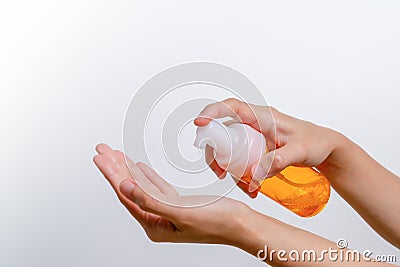 Cleansing wash essence, skin care. women hands holding cleansing bottle, beauty and body care concept Stock Photo