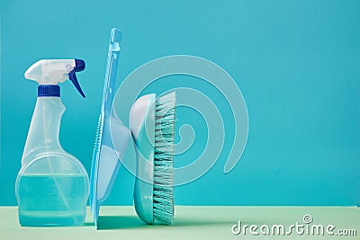 Cleanup at home. Housekeeping. Cleaning materials. Sweeping. Trowel and brush. Detergent spray. Copy space for text Stock Photo