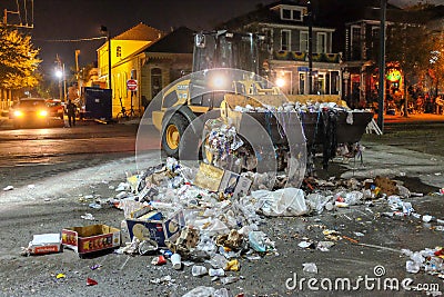 Cleanup after Mardi Gras Parade on St. Charles Avenue in New Orleans, LA Editorial Stock Photo