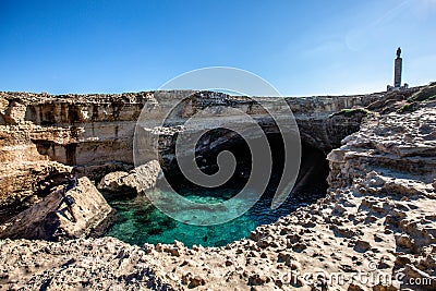 Clear blue sky at the Grotta della Poesia in the Puglia region of southern Italy which is really nothing more than a beautiful Stock Photo