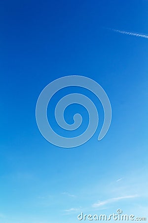 Clear blue sky with light white clouds Stock Photo