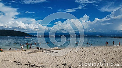 Clear blue sky and sandy beach at Sapi Island Sabah Borneo Malaysia Asia Editorial Stock Photo