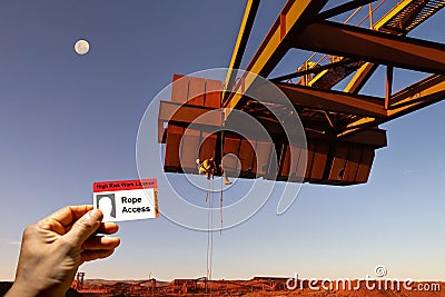 Clear image of rope access license authorization card with trained competent person rope tech conducting working at heights Stock Photo