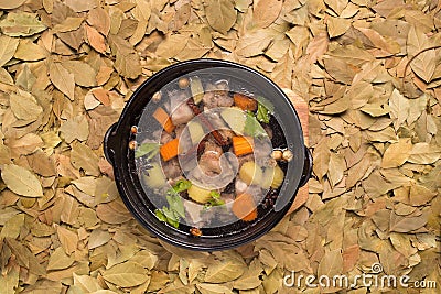 Clear oxtail soup on leaf background. Stock Photo