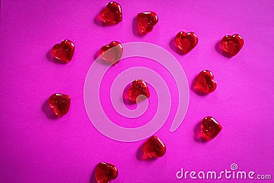 Clear red hearts on pink background for Valentine`s Day Stock Photo