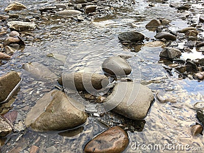 Clear river with rocks Stock Photo