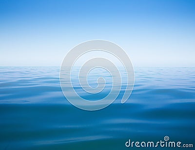 Clear sky and calm sea or ocean water surface Stock Photo