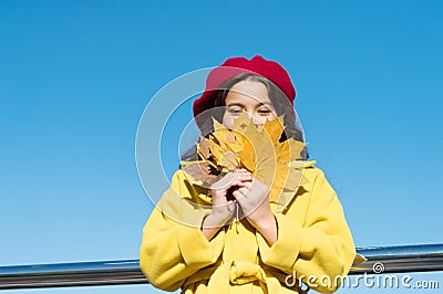Clear sky and good weather. Inspiring fall. Ideas for autumn leisure. Little girl adore autumn season. Kid hold maple Stock Photo