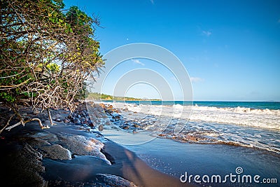 Clear sky over Grande Anse beach in Trois Rivieres Stock Photo