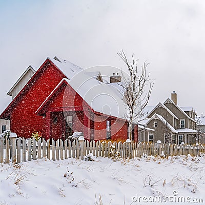 Clear Square Footprints on powdery snow along the charming homes at winter time in Utah Stock Photo