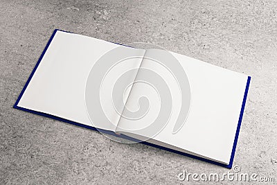 Clear white notepad on concrete surface Stock Photo