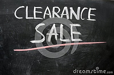 Clearance sale written on a blackboard Stock Photo