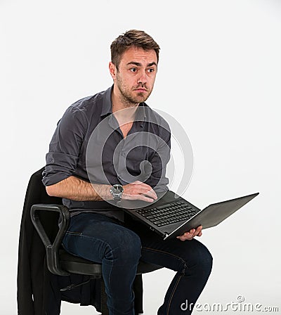 Clerk of works with a laptop Stock Photo