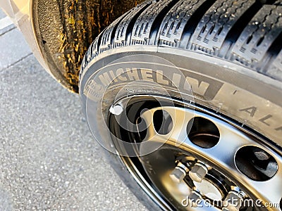 Close-up of new Michelin Alpin 6 Premium touring winter tyre mounted on a new Editorial Stock Photo