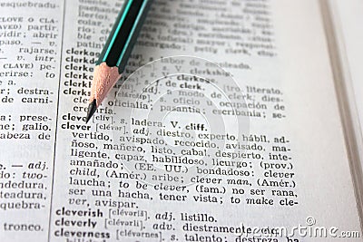 'clever' word in English-Spanish dictionary Stock Photo