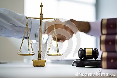 Client Lawyer Handshake In Courtroom Stock Photo