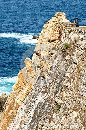 Cliff Divers jump at La Quebrada - Acapulco - Mexico Editorial Stock Photo