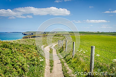 Cliff Path in Cornwall and blue sky Stock Photo