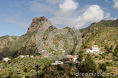 Cliff of Roque Cano and rural landscape. Stock Photo