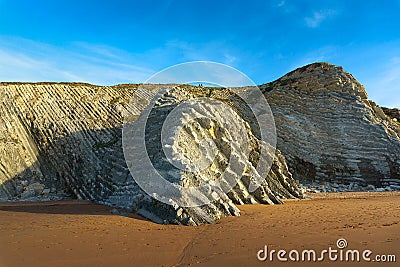Cliff of sedimentary rocks named flysch in Sopelana Stock Photo
