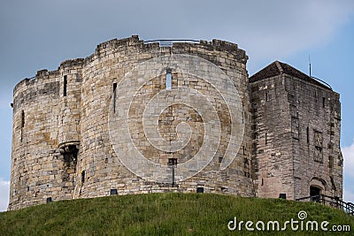 Clifford`s Tower, built at the top of a mound by William the Conqueror. Site of Jewish suicide and massacre of Jews by a mob. Editorial Stock Photo