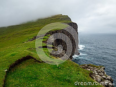 Cliffs of Faroe Islands. Ocean below. Stock Photo