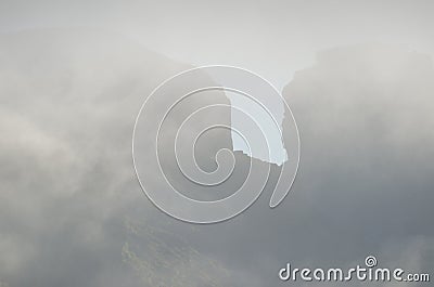 Cliffs in the fog. Stock Photo