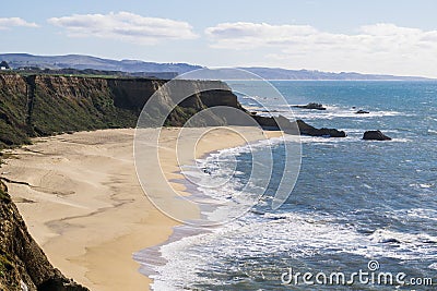 Cliffs and large half moon shaped beach, Pacific Ocean Coast, Half Moon Bay, California Stock Photo