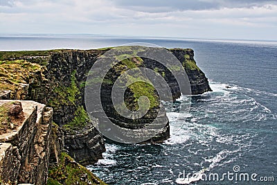 Cliffs of Moher at Hags Head where the Atlantic ocean and Liscanor Bay meet Stock Photo