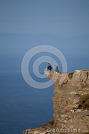 People taking a dangerous selfie, Cliffs of Moher, Ireland, UK Editorial Stock Photo