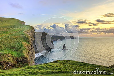 Cliffs of Moher at sunset in Ireland. Stock Photo