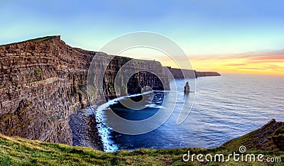 Cliffs of Moher at sunset in Ireland. Stock Photo