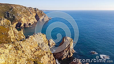 Cliffs over the Atlantic ocean. The westernmost point in Europe. The edge of the land. Cape Roca or Cabo da Roca, Portugal Stock Photo