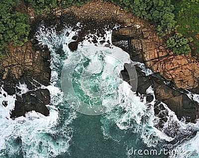 Cliffs with waves aerial view Stock Photo
