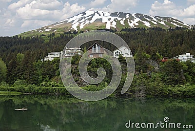 Cliffside lodges / wooden houses on Cliff View Place Stock Photo