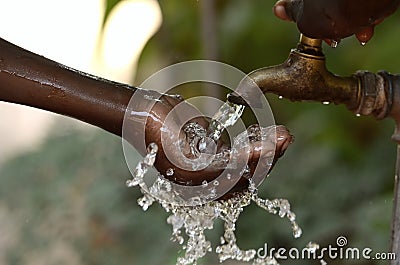 Climate Change Symbol: Handful Of Water Scarsity for Africa Symbol Stock Photo