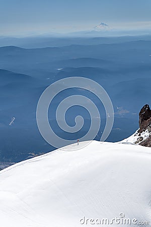A climber against the edge of the glacier on the epic peak of Mt Hood Oregon Editorial Stock Photo