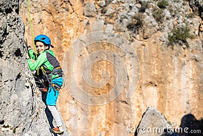 climber boy. the child trains in rock climbing Stock Photo
