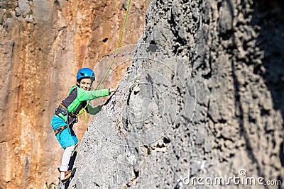 climber boy. the child trains in rock climbing Stock Photo