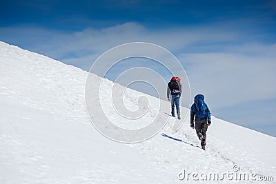 Climbers go up on the glacier Stock Photo