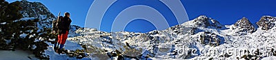 Climbers looking at the Bucura 1 peak in Retezat mountains, Romania Stock Photo