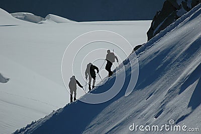 Climbers on ridge Stock Photo