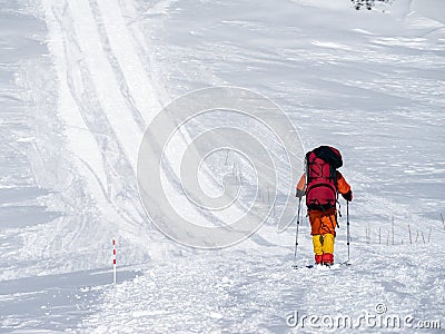 Climbing alpinist in Caucasus mountains Stock Photo