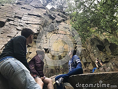 Climbing a cliff along the St. Croix River Valley Editorial Stock Photo