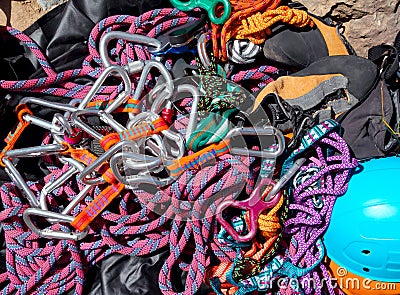 Climbing equipment shackles harnesses ropes Stock Photo