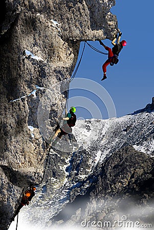 Climbing a high mountain Stock Photo