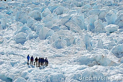 Climbing the snowy mountain Stock Photo